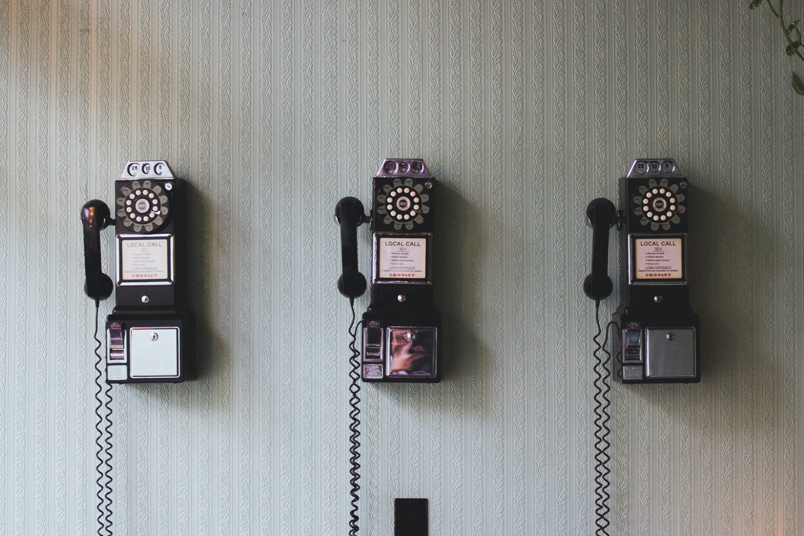 Three Telephones by Pavan Trikutam on Unsplash